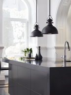 Oil rubbed bronze pendant with a dome-like shade