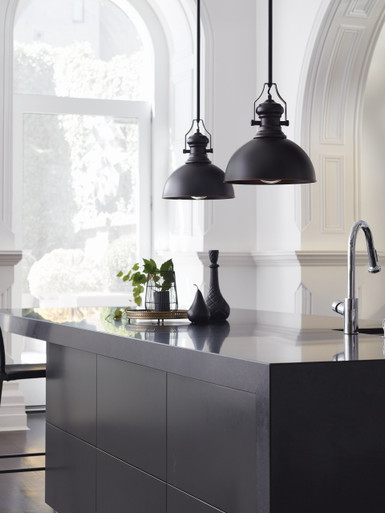 Oil rubbed bronze pendant with a dome-like shade