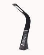 Black table lamp with built-in clock