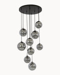 Black nine light pendant with smoke glass