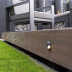 Textured black one-way inground deck light