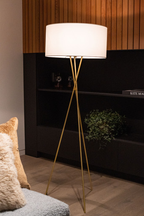 Brass tripod floor lamp with white shade