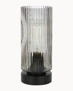 Black table lamp with ribbed smoke glass