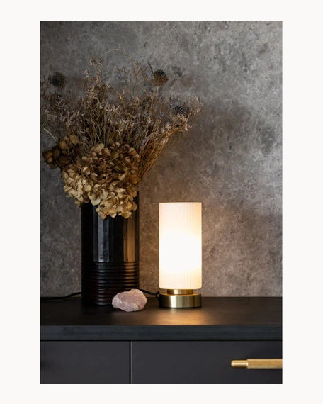 Brass table lamp with ribbed opal glass