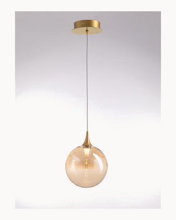 Brass pendant with amber glass
