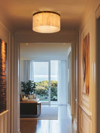 Aged brass trim pendant with natural alabaster glass